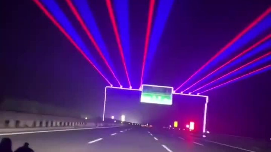 ⁣In China they made a laser show on the roads for drivers